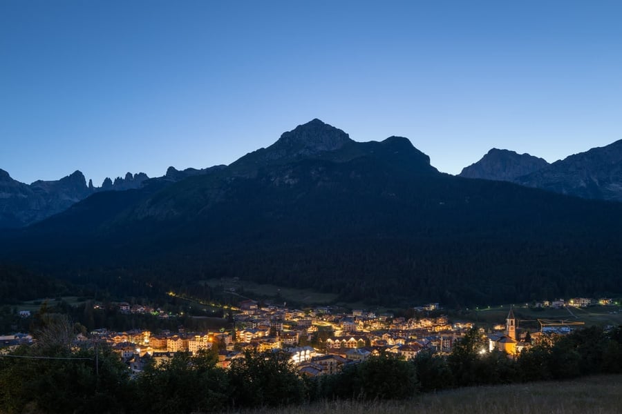 Andalo at dusk — The town's lights coming on beneath the Paganella