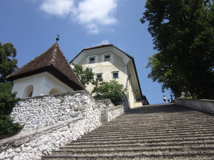 Church of the Assumption on the island — Ninety-nine steps separate the pier from the church's portal