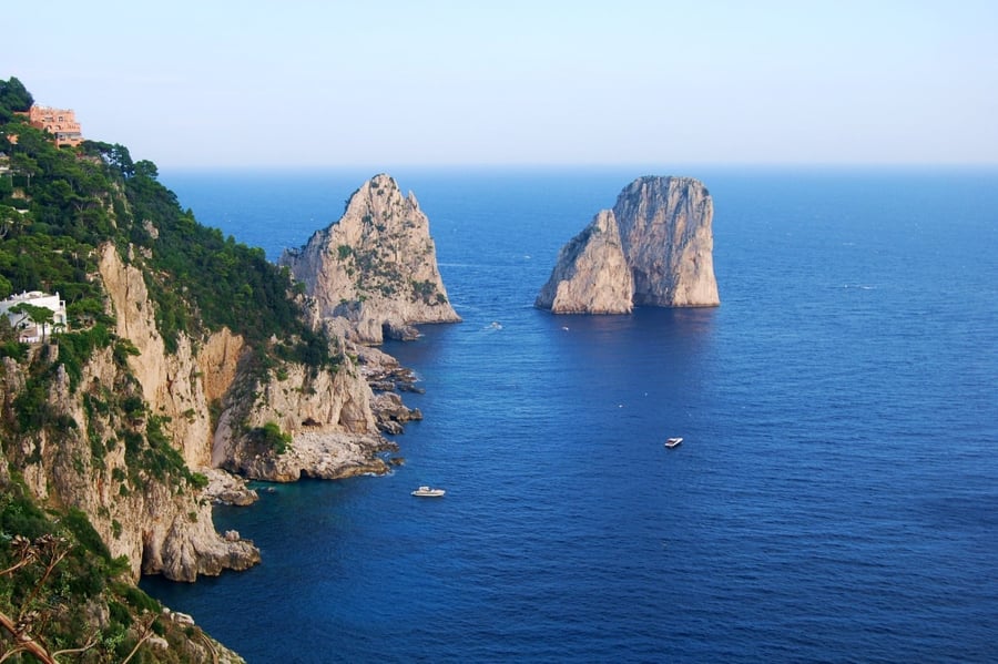 The Faraglioni — The three sea stacks that symbolise the island