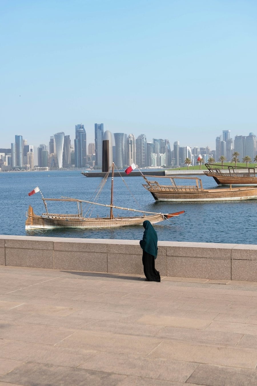 Doha Corniche — Traditional dhows in front of the West Bay skyscrapers