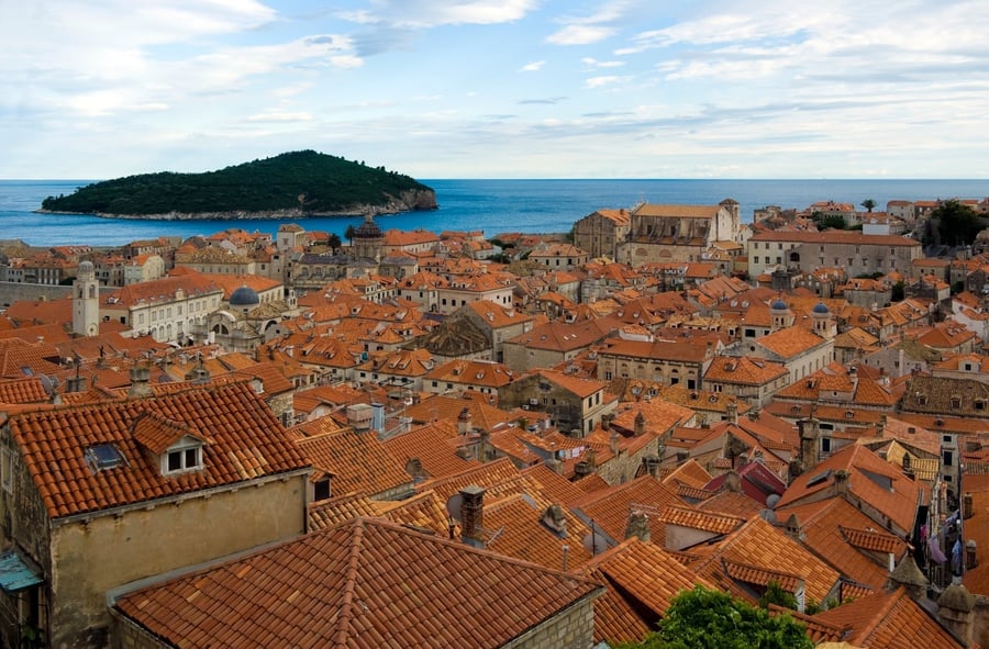 The city seen from the Walls — Red-tiled rooftops and the island of Lokrum beyond