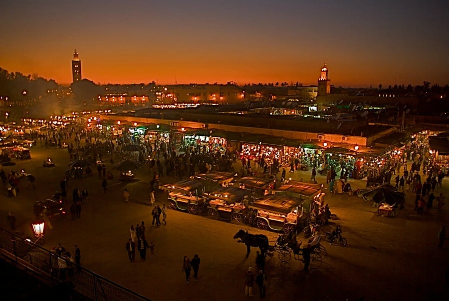 Jemaa el-Fnaa Square — Storytellers, snake charmers and food stalls under the stars