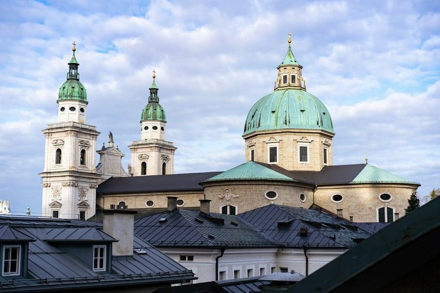 Salzburg Cathedral — The twin towers and green dome of the baroque cathedral where Mozart was baptised