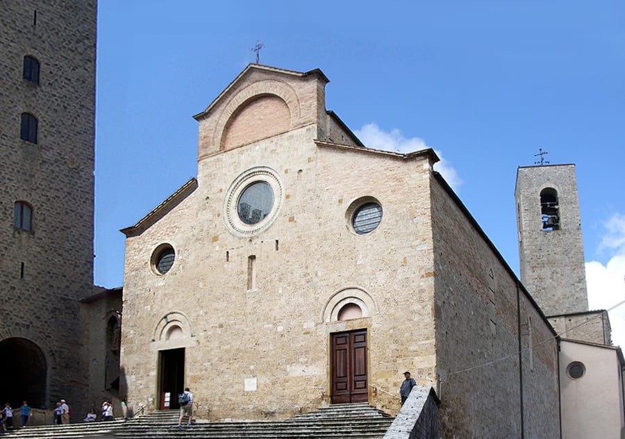 Collegiata di Santa Maria Assunta — Una facciata romanica semplice che nasconde cicli di affreschi trecenteschi