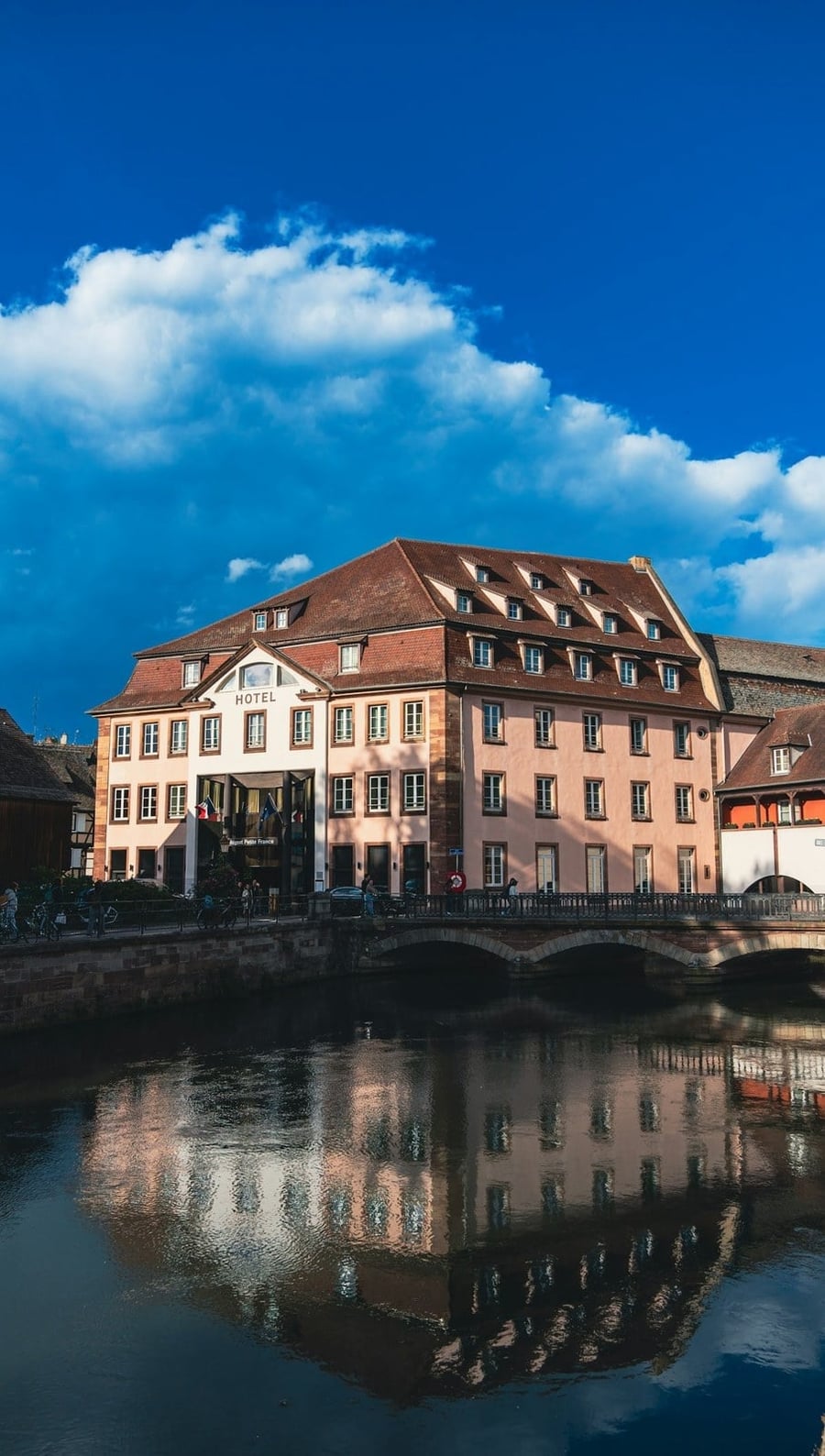 La Petite France — Half-timbered houses mirrored in the canals of the Ill